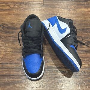 Nike Air Jordan’s big Kids Black, White, and Blue Sneakers